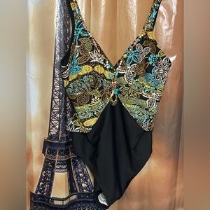 Bathing suit one piece with bead work attached